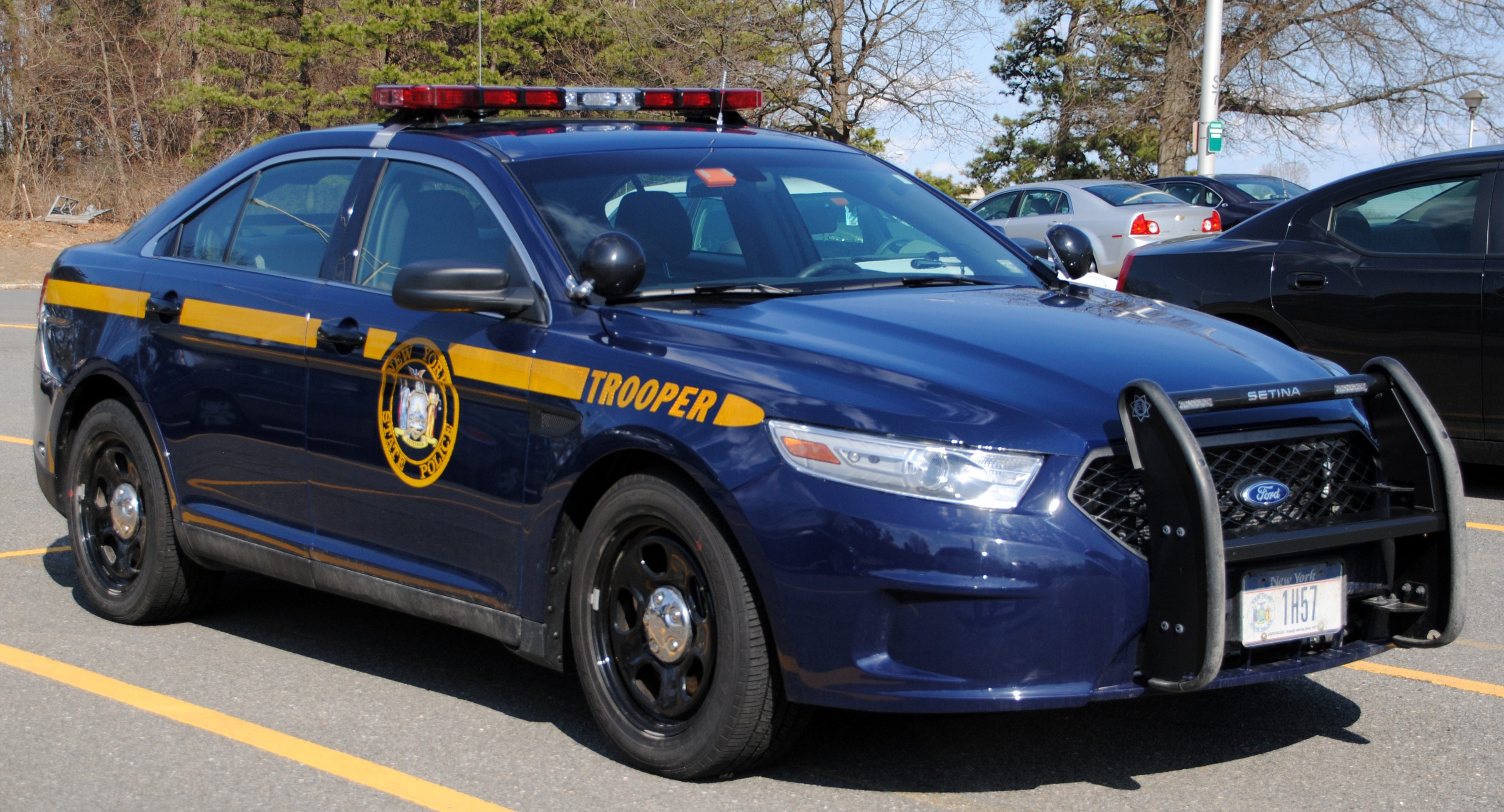 Синяя полицейская машина. Ford Taurus Police Interceptor. Форд Таурус полиция. Форд Таурус полиция США. Ford Taurus Police 2016.
